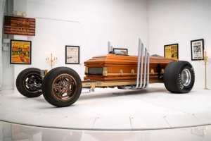 A coffin-on-wheels car sold at auction for 28 750 USD