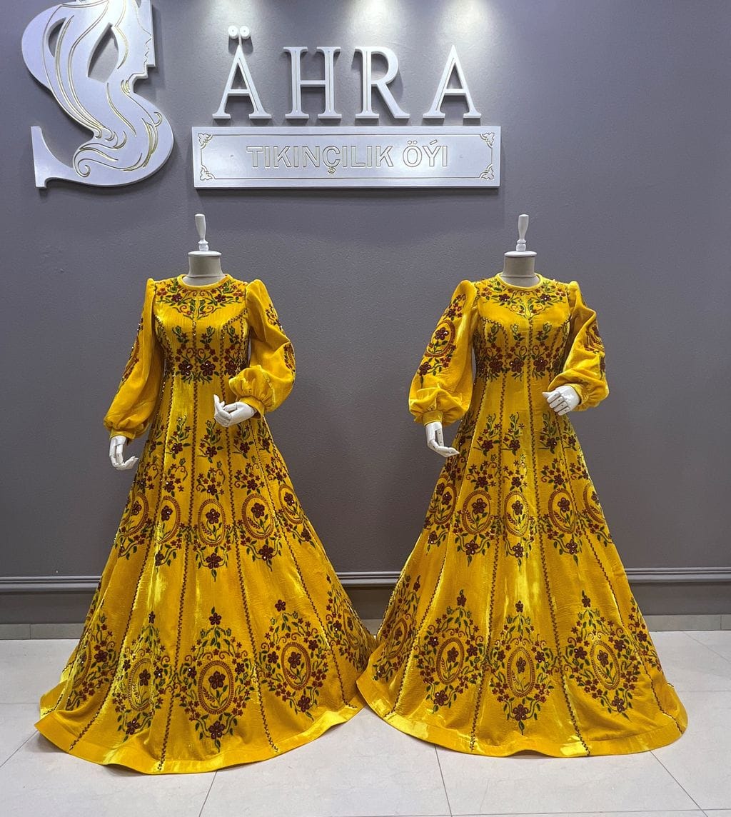 Craftswomen of the Sähra studio create exclusive outfits in the national Turkmen style for all occasions