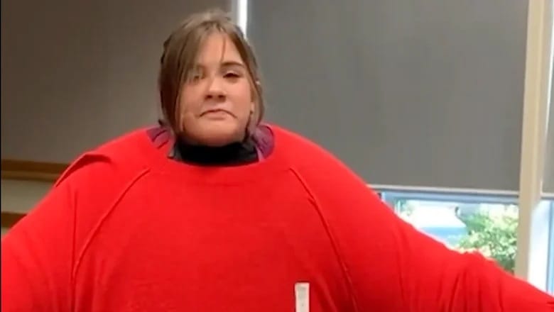 An American woman set a record by wearing 45 sweaters at the same time