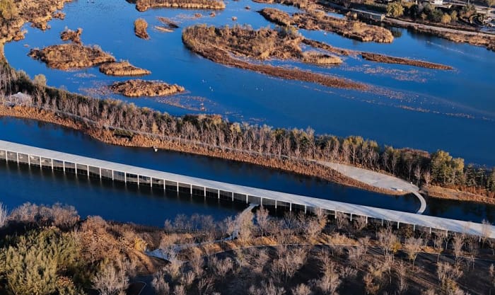 A kilometer-long museum above a lake has opened in China