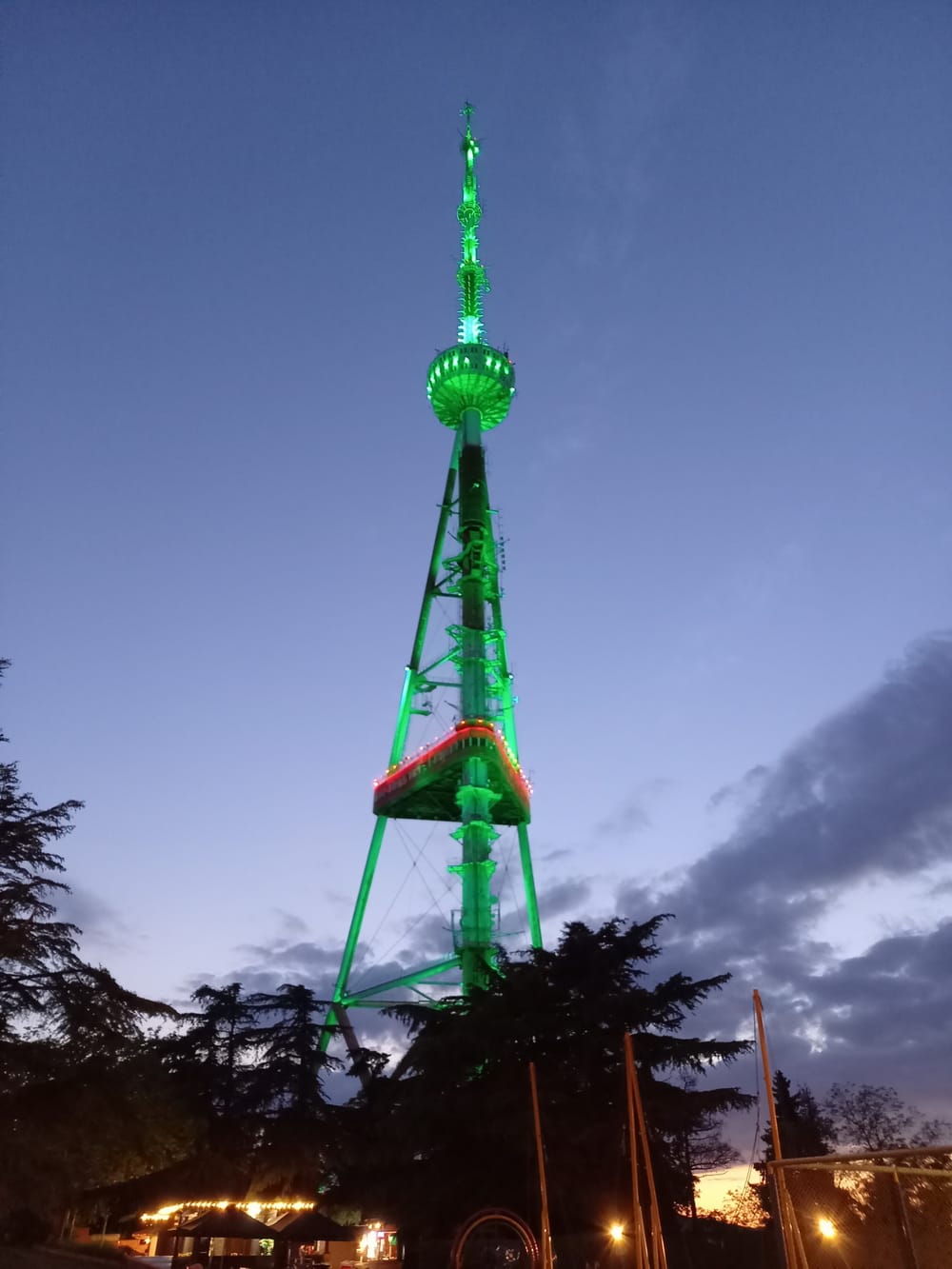 Tbilisi television tower painted in the colors of the Turkmen flag