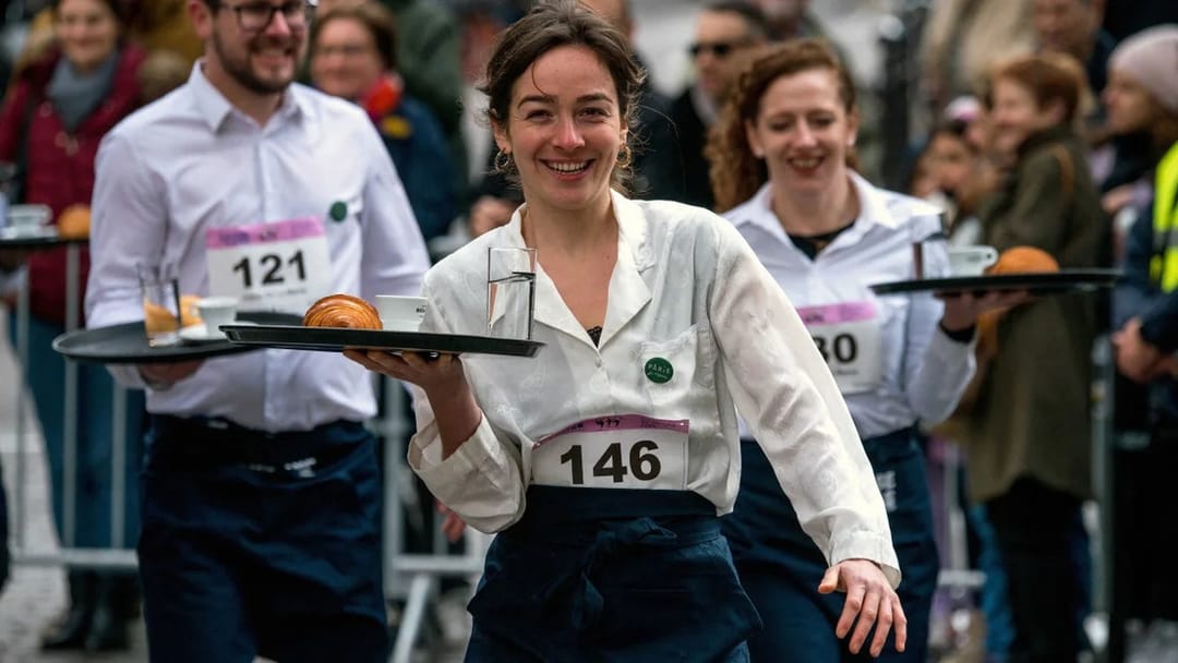 A race of waiters with trays was held in Paris