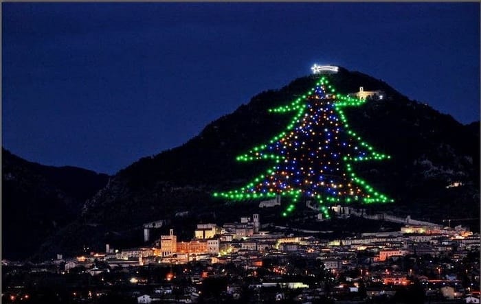 The largest Christmas tree in the world is lit again in Italy