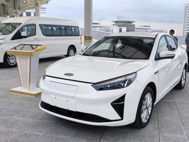 JAC E-J7 electric car presented at transport exhibition in Ashgabat