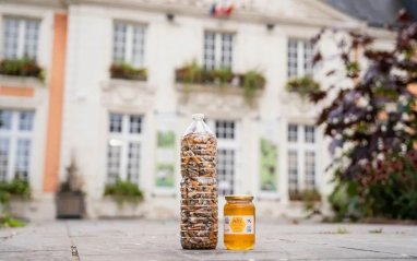 French town exchanges cigarette butts for honey