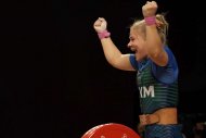 Fotoreportaž: Türkmenistanly agyr atletikaçy Polina Gurýewa Tokiodaky Olimpiadada kümüş medalyny gazandy